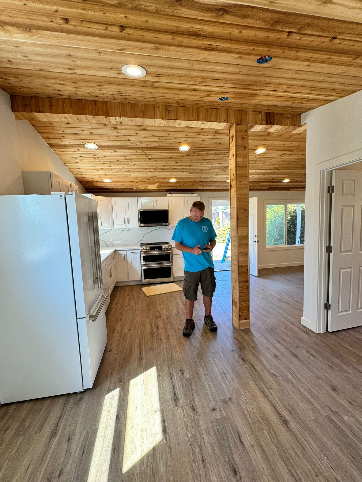 ADU kitchen remodel with wood ceiling and open floor plan in Portland