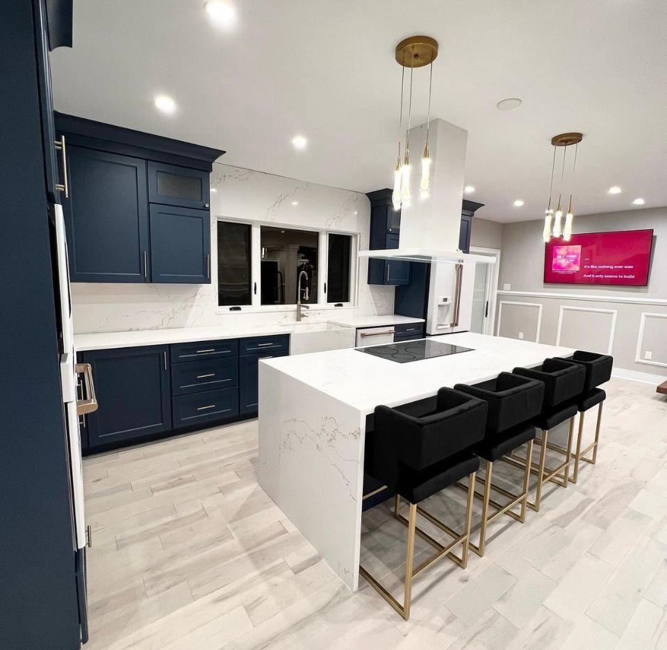 Navy blue open-concept kitchen and dining area in Portland
